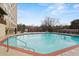 Community swimming pool with brick coping at 2479 Peachtree Ne Rd # 1410, Atlanta, GA 30305