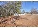 Large backyard with shed and wooden fence at 4785 Old Douglasville Rd, Lithia Springs, GA 30122