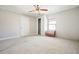 Spacious bedroom with ceiling fan and carpet at 4785 Old Douglasville Rd, Lithia Springs, GA 30122