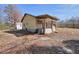 Ranch-style home with covered porch and detached shed at 4785 Old Douglasville Rd, Lithia Springs, GA 30122