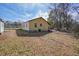 Side view of a ranch home with a green metal roof at 4785 Old Douglasville Rd, Lithia Springs, GA 30122