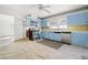 Kitchen with blue cabinets and stainless steel appliances at 4785 Old Douglasville Rd, Lithia Springs, GA 30122