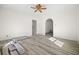 Living room with new flooring and ceiling fan at 4785 Old Douglasville Rd, Lithia Springs, GA 30122