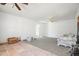 Spacious living room with tiled floors and ceiling fan at 4785 Old Douglasville Rd, Lithia Springs, GA 30122