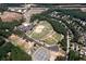 Aerial view of community with baseball fields at 5138 Mcever View Dr, Sugar Hill, GA 30518