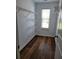 Walk-in closet with ample shelving and window at 5138 Mcever View Dr, Sugar Hill, GA 30518