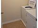 Convenient laundry room with washer and dryer at 5138 Mcever View Dr, Sugar Hill, GA 30518