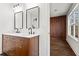 Double vanity bathroom with marble countertop and hexagon floor tile at 1956 Gober Se Ave, Smyrna, GA 30080