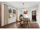 Bright dining area with wood floors and a view to the outside through a window at 1956 Gober Se Ave, Smyrna, GA 30080