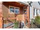 Charming front porch with wood railings and vertical wood accents, offering curb appeal at 1956 Gober Se Ave, Smyrna, GA 30080