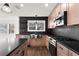 Well-equipped kitchen with stainless steel appliances, a large sink, and stylish cabinetry enhances the cooking experience at 1956 Gober Se Ave, Smyrna, GA 30080