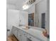 Double vanity bathroom with a large mirror and shower at 23 Spring Folly Nw, Cartersville, GA 30121
