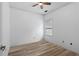 Simple bedroom with wood-look floors and a window at 23 Spring Folly Nw, Cartersville, GA 30121