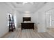 Bright bedroom with wood-look floors and a ceiling fan at 23 Spring Folly Nw, Cartersville, GA 30121