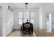 Bright breakfast nook with wood flooring and built in shelving at 23 Spring Folly Nw, Cartersville, GA 30121