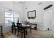 Bright dining area features hardwood floors and a charming table setting at 23 Spring Folly Nw, Cartersville, GA 30121