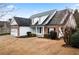Two-story house with white siding and a brick accent wall at 23 Spring Folly Nw, Cartersville, GA 30121