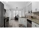 Modern kitchen with granite countertops and stainless steel appliances at 23 Spring Folly Nw, Cartersville, GA 30121