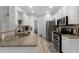 Modern kitchen with granite countertops and stainless steel appliances at 23 Spring Folly Nw, Cartersville, GA 30121