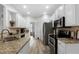 Modern kitchen with granite countertops and stainless steel appliances at 23 Spring Folly Nw, Cartersville, GA 30121