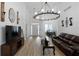 Open living space with hardwood floors and a chandelier at 23 Spring Folly Nw, Cartersville, GA 30121