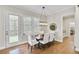 Bright dining area with access to screened porch and butler's pantry at 115 Hedgewood Ln, Canton, GA 30115