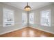 Dining room featuring three large windows at 115 Hedgewood Ln, Canton, GA 30115