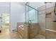 Luxurious bathroom with soaking tub, walk-in shower, and glass enclosure at 3340 Switchbark Ln, Alpharetta, GA 30022