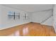 Bright living room with hardwood floors and a staircase at 1687 Briarcliff Ne Rd # 8, Atlanta, GA 30306