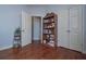 Bright bedroom with hardwood floors and ample closet space at 6982 Springwood Dr, Douglasville, GA 30135