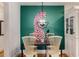 Dining area with a pink cheetah wall and chandelier at 974 Greenwood Ne Ave # 2, Atlanta, GA 30306