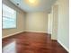 Simple bedroom with hardwood floors and ample closet space at 1635 River Main Ct, Lawrenceville, GA 30044