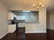 Dining area with hardwood floors and kitchen views at 1635 River Main Ct, Lawrenceville, GA 30044