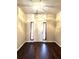 Bright entryway with dark hardwood floors at 1635 River Main Ct, Lawrenceville, GA 30044