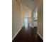 Hardwood floor hallway leading to living areas at 1635 River Main Ct, Lawrenceville, GA 30044