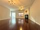 Bright living room featuring hardwood floors and a fireplace at 1635 River Main Ct, Lawrenceville, GA 30044