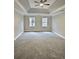 Bright and airy bedroom with ceiling fan and carpet at 295 Creekview Trl, Fayetteville, GA 30214