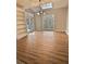 Breakfast area with hardwood floors, built-in shelving, and a view to backyard at 295 Creekview Trl, Fayetteville, GA 30214