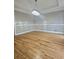 Formal dining room with hardwood floors and a crystal chandelier at 295 Creekview Trl, Fayetteville, GA 30214