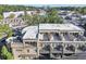 Aerial view of townhouses with private rooftop decks and surrounding cityscape at 3633 Habersham Rd, Atlanta, GA 30305