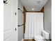 Simple bathroom with shower/tub combo and neutral tile at 3633 Habersham Rd, Atlanta, GA 30305