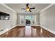 Main bedroom with hardwood floors and access to private balcony at 3633 Habersham Rd, Atlanta, GA 30305