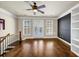 Bonus room with hardwood floors, built-in shelving and French doors at 3633 Habersham Rd, Atlanta, GA 30305