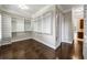 Large walk-in closet with custom shelving and hardwood floors at 3633 Habersham Rd, Atlanta, GA 30305