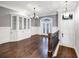 Elegant dining room with hardwood floors, built-in shelving, and chandelier at 3633 Habersham Rd, Atlanta, GA 30305