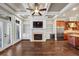 Spacious Gathering room with fireplace and built-in shelving at 3633 Habersham Rd, Atlanta, GA 30305