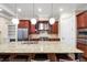 Gourmet kitchen with granite countertops and stainless steel appliances at 3633 Habersham Rd, Atlanta, GA 30305