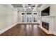 Bright living room with hardwood floors and coffered ceiling at 3633 Habersham Rd, Atlanta, GA 30305