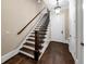 Elegant staircase with dark wood treads and wrought-iron railing at 3633 Habersham Rd, Atlanta, GA 30305