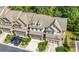 Townhouses with gray roofs and landscaping, aerial view at 5649 Cobblestone Creek Pl # 13, Mableton, GA 30126